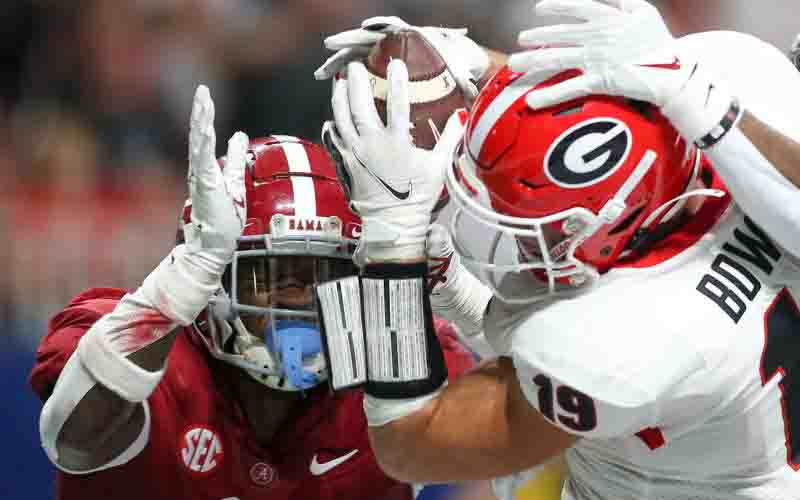 Georgia player tackles Alabama player