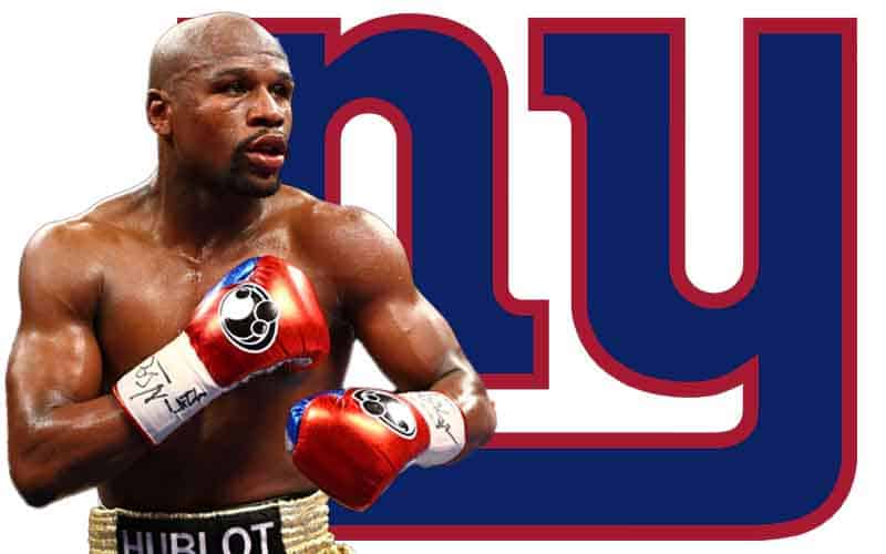 Floyd Mayweather in front of a New York Giants logo