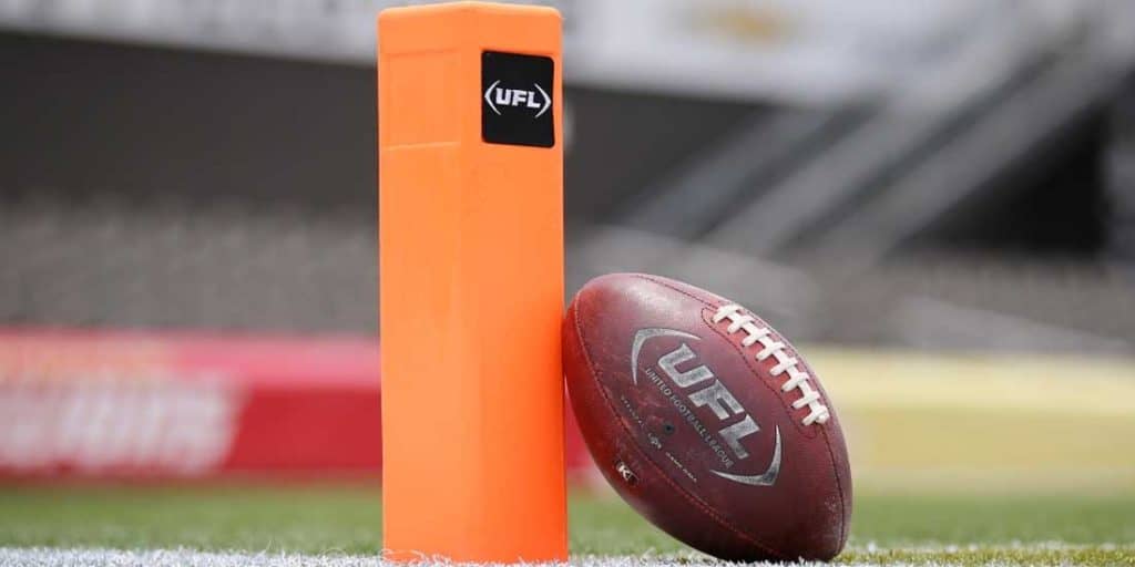 UFL ball leaning on post